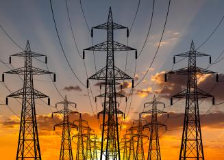 Power towers with golden sunset